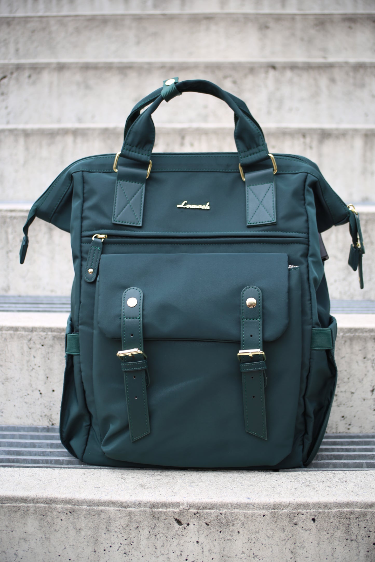 Morral poliéster con 22 bolsillos color verde